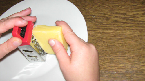 Children Grating Cheese