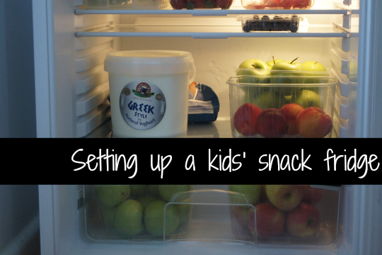 Setting up a kids' snack fridge
