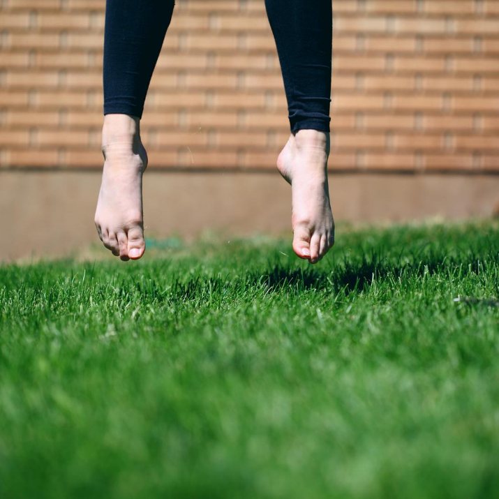 5 easy ways to boost your mood when feeling flat - walk barefoot on the grass